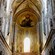 La nave interior de la catedral basílica de Cefalú, que deja ver un elaborado mural en el que se observan Cristo, ángeles y los doce discípulos